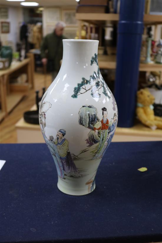 A Chinese famille rose baluster shaped vase, 20th century, height 33cm, wood stand